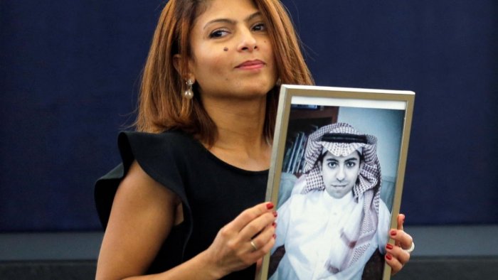 Raif Badawi Wife With His Portrait