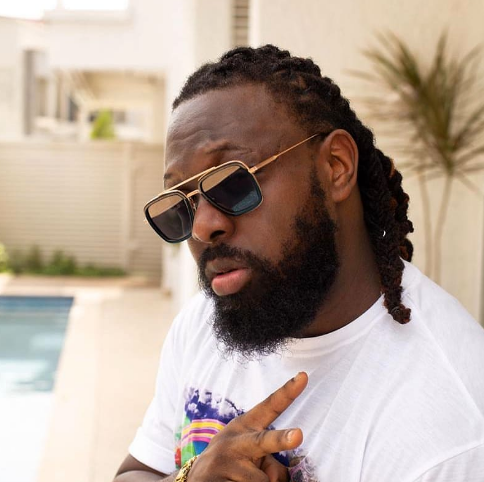 Reactions to Timaya sharing an old photo as she says, “I Waited To Get My Money Right”