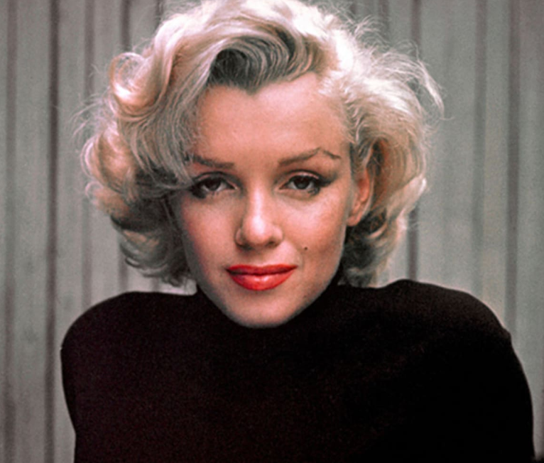 Has Marilyn Monroe been adopted?  Was she an orphan?